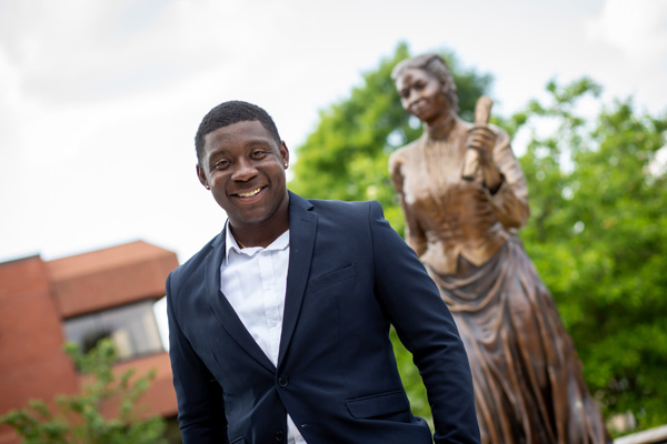 A student at the Fanny Jackson Coppin Statue