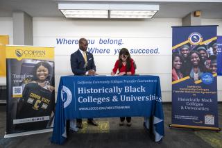 President Jenkins with Chancellor Christian signing the transfer agreement in California.